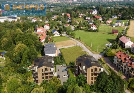 Okolica inwestycji zdjęcie z drona +wizualizacja inwestycji