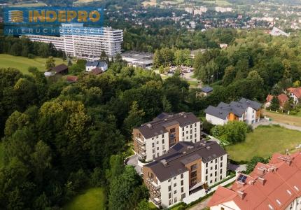 Okolica inwestycji zdjęcie z drona +wizualizacja inwestycji